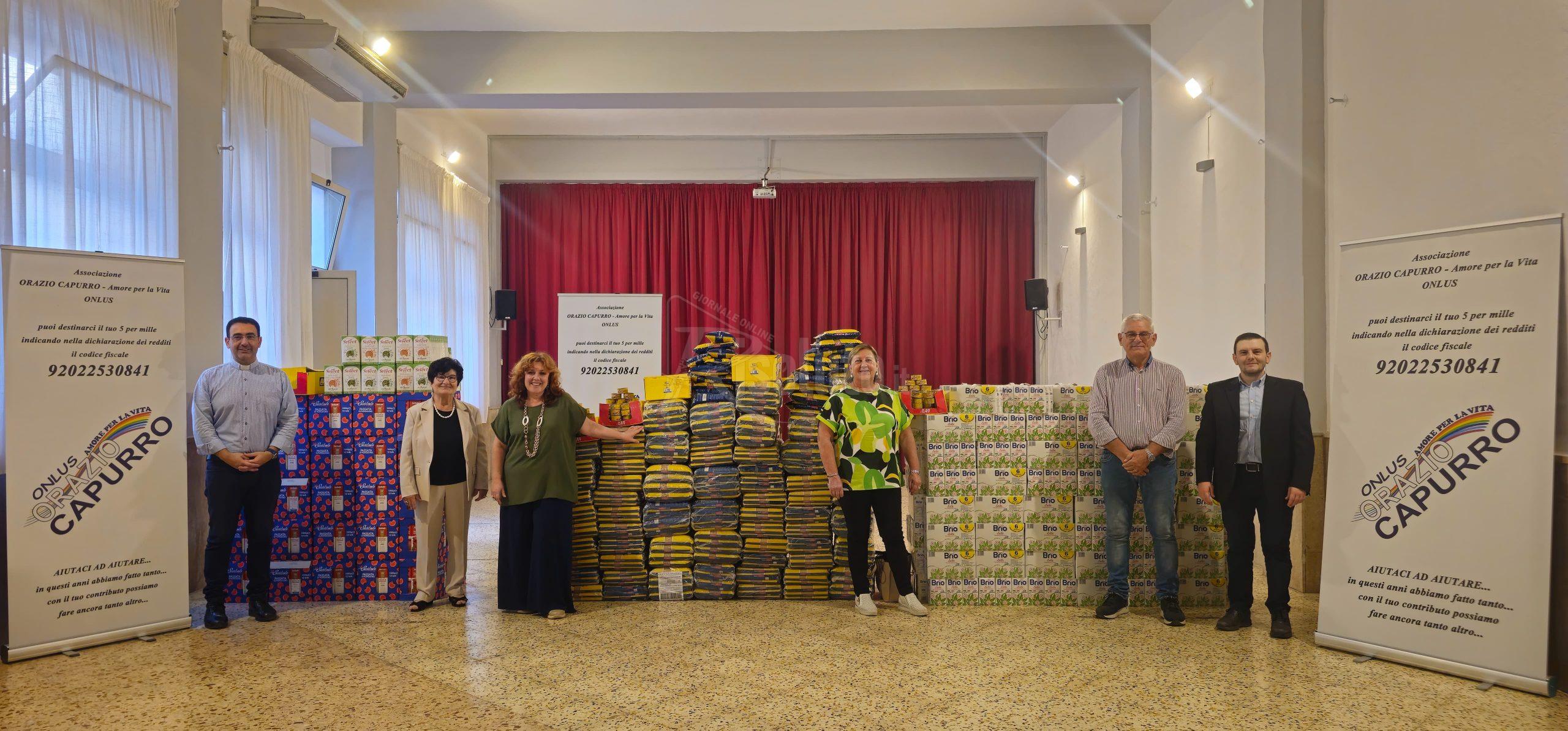 L'associazione "Orazio Capurro" dona alla Caritas alimenti di prima necessità (Video)