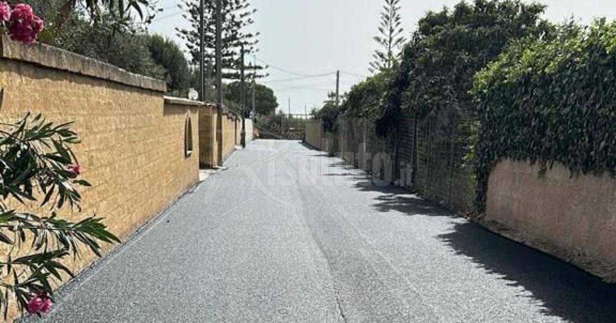 Posa dell'asfalto su via Casello Vassallo a San Marco, ormai ex trazzera