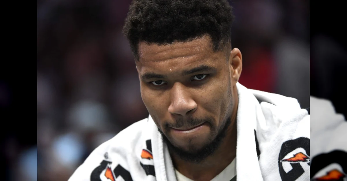 Giocatore di basket NBA con canestro sullo sfondo, illustrazione dello scambio clamoroso di Giannis Antetokounmpo ai Miami Heat